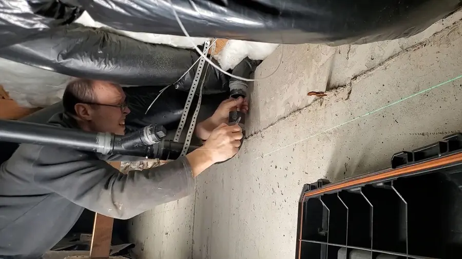Crawlspace drain piping and cleanout work below a home related to Leak Detection in Altadena, CA
