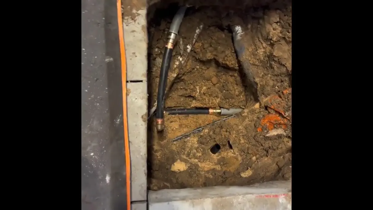 Exposed slab piping and leak detection work on a concrete floor for When to Call an Emergency Plumber